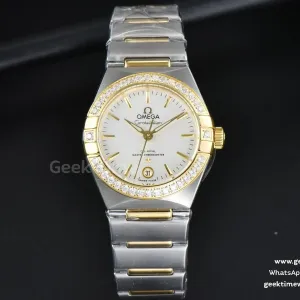 Constellation 29mm TWSF YG esfera blanca con diamantes índices de bastón brazalete YG/SS A8700
